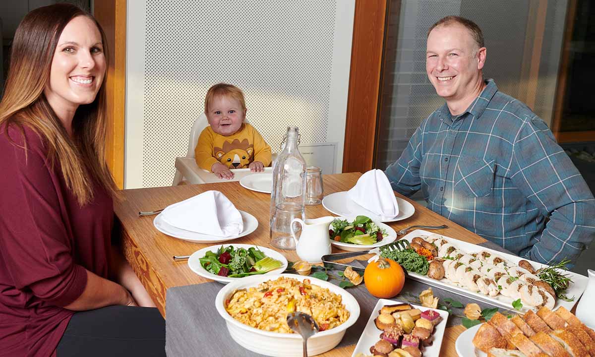A family enjoy meal together at RMH BC & Yukon